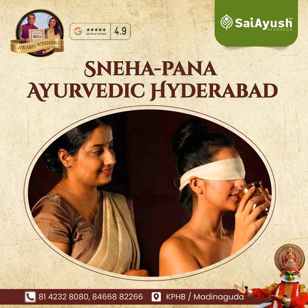 Two women in traditional attire, one administering Sneha Pana Ayurvedic therapy while the other, blindfolded, drinks from a brass cup. Award-winning SaiAyush Ayurveda, Hyderabad. Contact information and location in KPHB/Madinaguda.